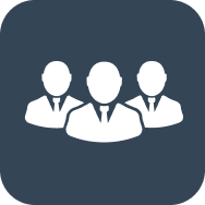 A group of people with ties on standing next to each other.